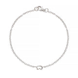 White gold bracelet with a small bear charm on a white background