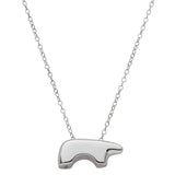 14k white gold bear-shaped pendant on a chain against a white background