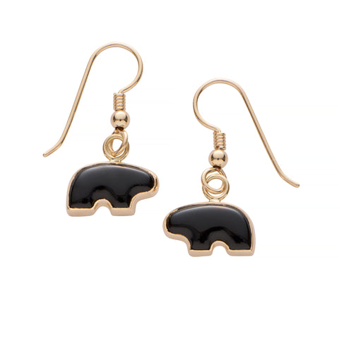 Gold earrings with onyx stone bear  on a white background