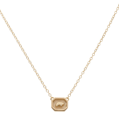 Gold necklace with a hexagonal pendant featuring a Bear on a white background