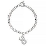 Silver bracelet with a charm on a white background