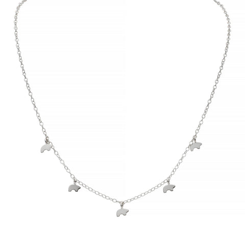 Silver necklace with small bear charms on a white background