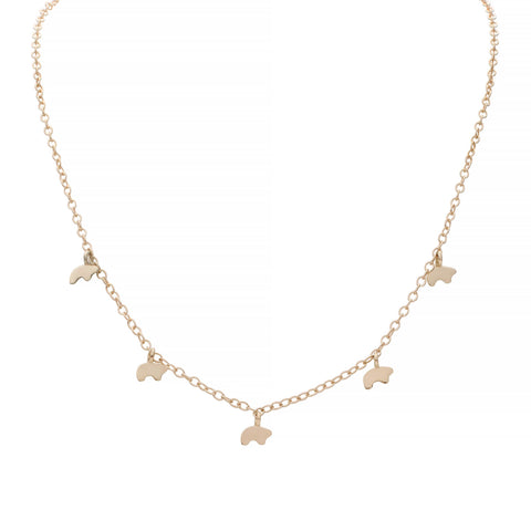 14k yellow Gold necklace with small bear pendants hanging on a white background