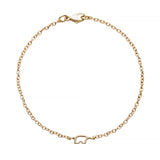 Gold bracelet with a small bear charm on a white background