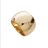 14k yellow gold hammered dome shaped ring on a white background