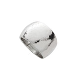 sterling silver hammered dome shaped ring on a white background