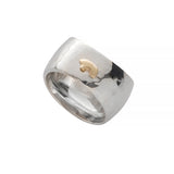 Bottom side of sterling silver hammered dome ring with 14k yellow gold teensy bear