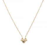 Gold fox-shaped pendant necklace on a white background