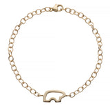 Gold chain bracelet with a silhouette bear charm  on a white background