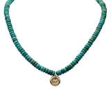 Turquoise beads with 14ky Bear disc necklace