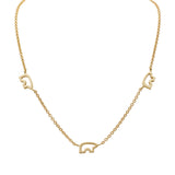 Gold necklace with elephant and heart-shaped pendants on a white background