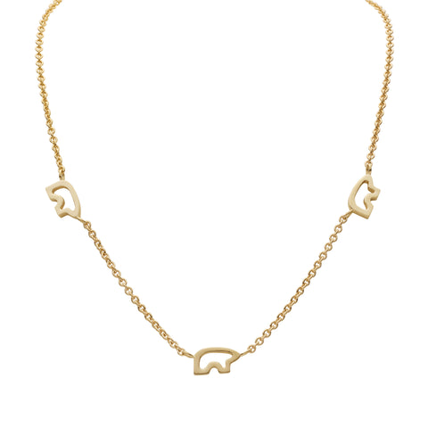Gold necklace with elephant and heart-shaped pendants on a white background