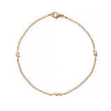 14k yellow Gold bracelet with small bear charms on a white background