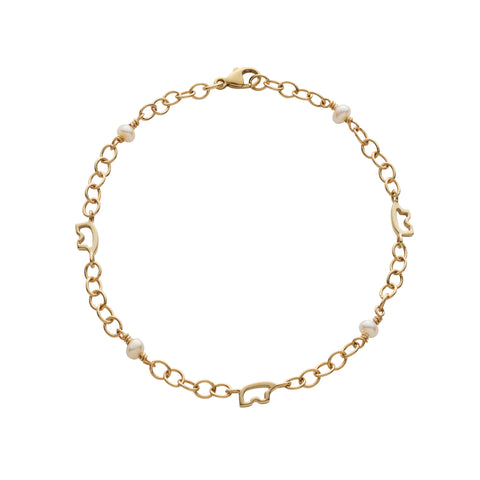 Gold chain bracelet with silhouette bears and small pearls on a white background