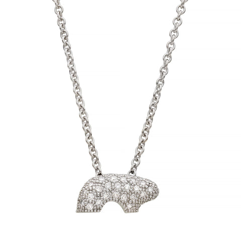 White gold and pave necklace with a bear-shaped pendant on a white background
