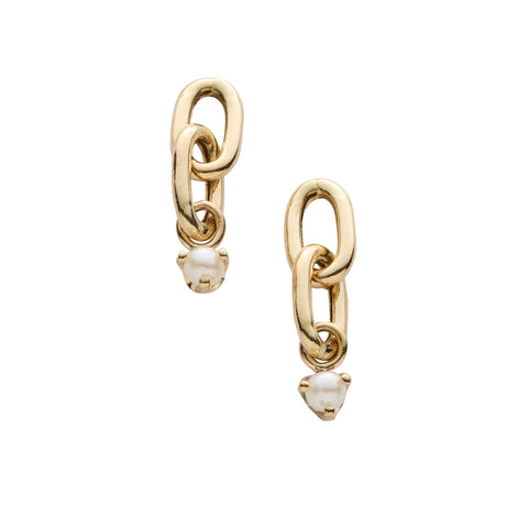 Gold chain link earrings with  pearl drops on a white background