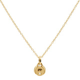 Gold necklace with a small pendant featuring our etched Bear and a diamond on a white background