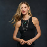Model wearing mixed chain necklace