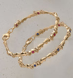 18ky Gold Blue Sapphire Tennis Bracelet
